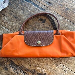 AUTHENTIC Longchamp Orange Signature Foldable Design NEW w/o tags NEVER USED